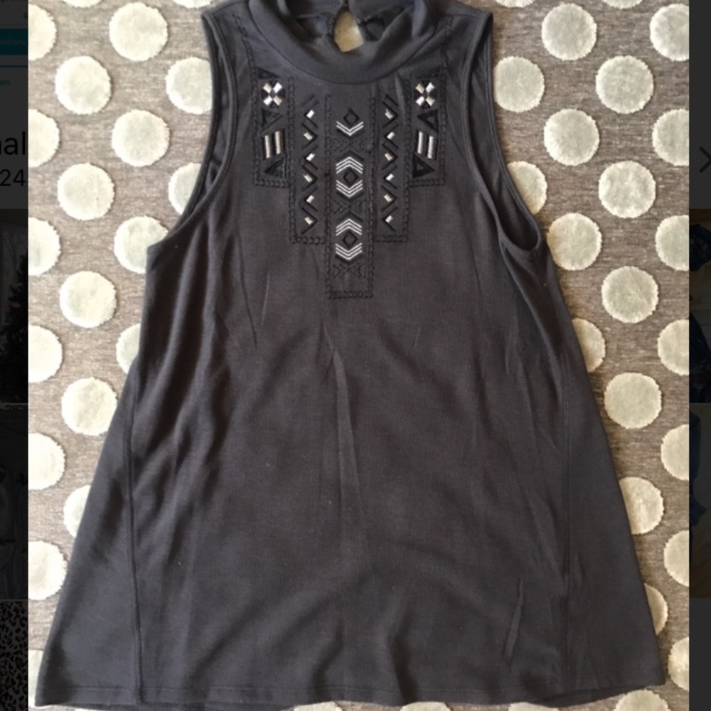 High neck style, loose fitting top